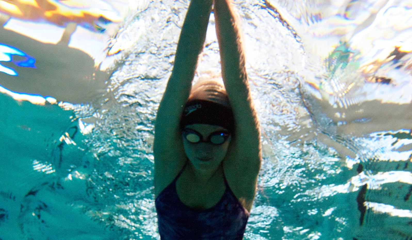 Underwater view of person swimming in the Sanderson Center Pool